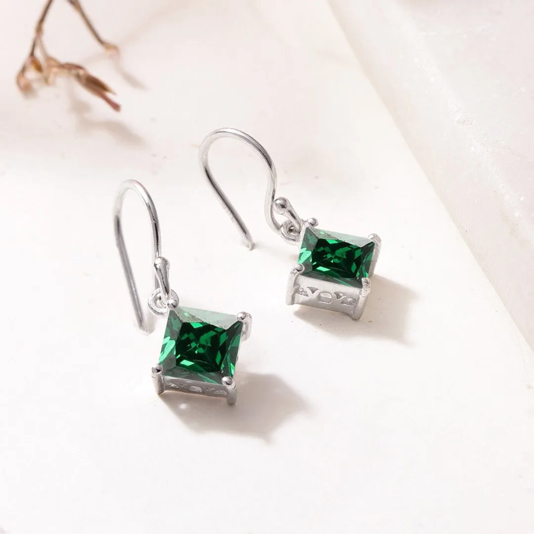 Enchanting Emerald: Rhodium-Plated 925 Sterling Silver Earrings with Green Sparkle